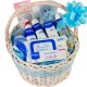 Canastilla de bebé para un baño hidratante con productos Mustela Baby y accesorios de farmacia